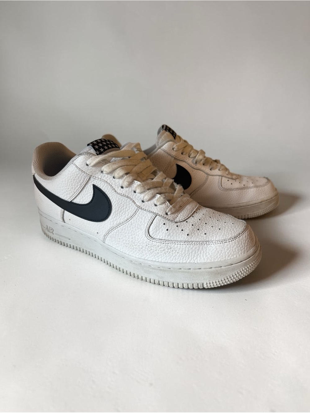 Men's White Leather Sneakers with Black Swoosh Accent